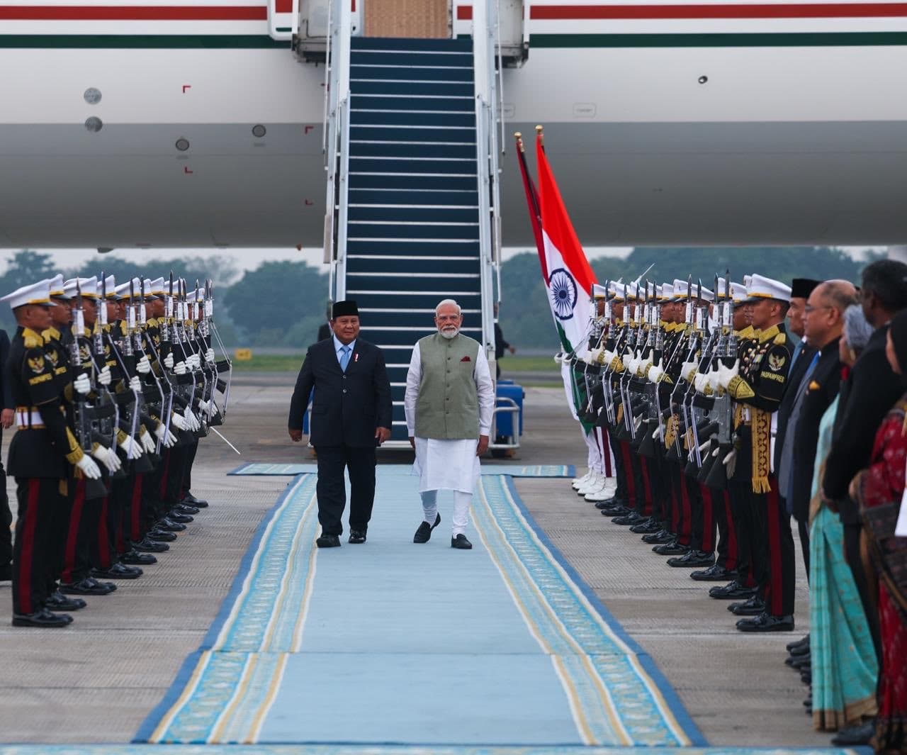 PM Modi arrives in Jakarta as Indonesian President Prabowo Subianto welcomes him with a ceremonial guard of honour during his Indonesia visit.
