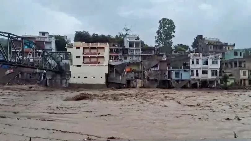 A view of the overflowing Dharhali River which triggered flash floods following heavy rainfall, in Rajouri | File image/ANI