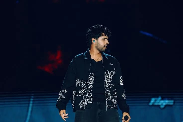 Singer Armaan Malik posing during a public appearance after announcing the postponement of his upcoming song release.