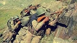 Indian Army soldiers paying homage at the Kargil War Memorial in Drass during Kargil Vijay Diwas commemorations.